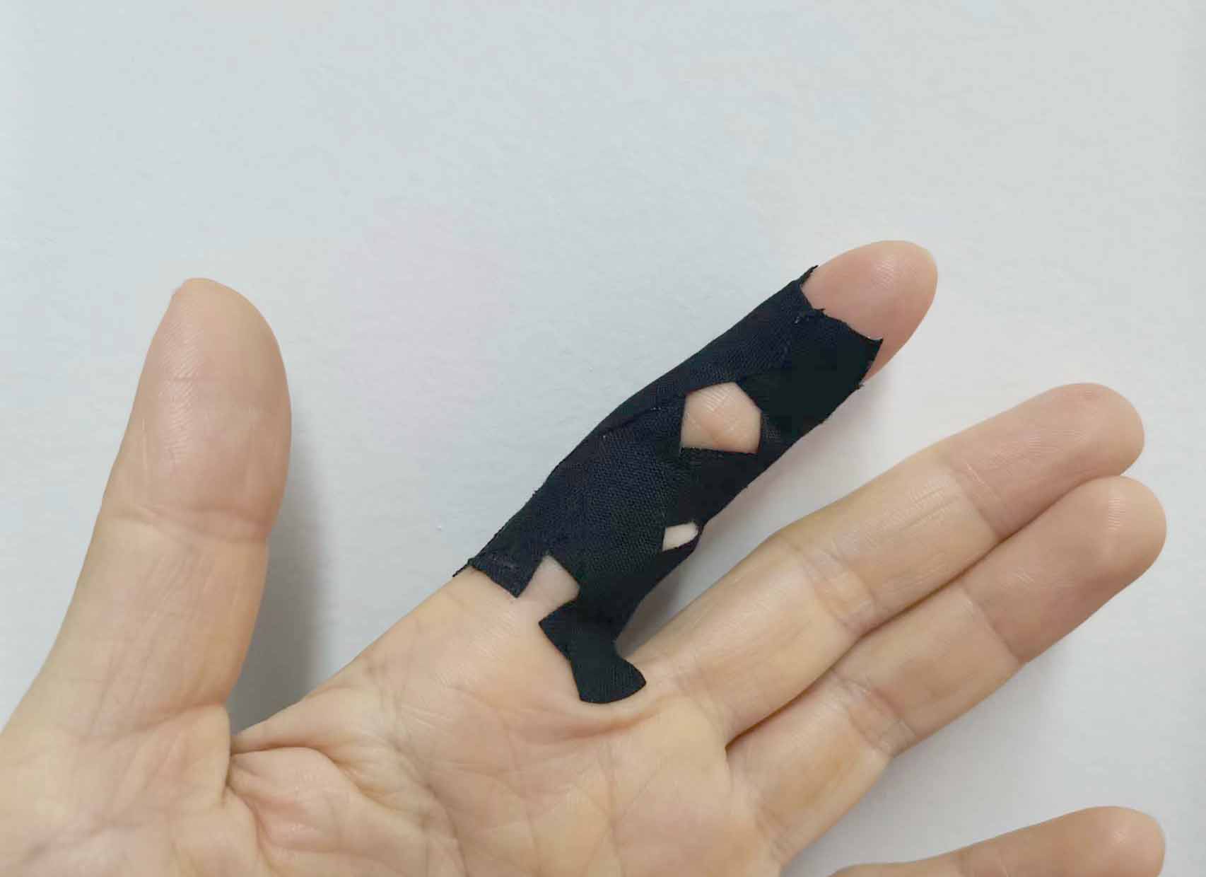 finger-tape-crossing